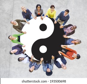 Multiethnic People Holding Hands With Yin And Yang Symbol