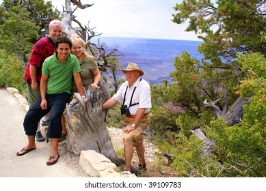 Multi-ethnic Tourist Family In Grand Canyon National Park - North Rim