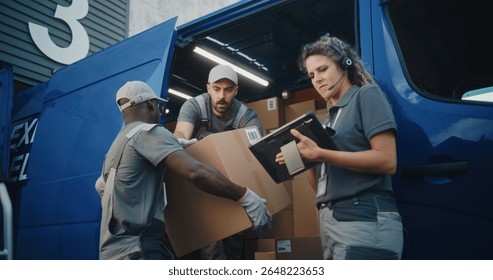 Multiethnic Workers Loading Cardboard Boxes with Online Orders, E-Commerce Goods in Delivery Truck. Female Manager Using Tablet Computer and Barcode Scanner. Outside of Logistics Retail Warehouse.