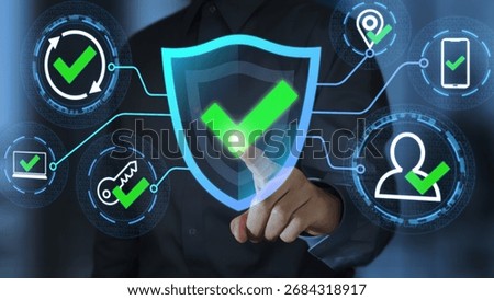 Multi-Factor Authentication MFA. Passwordless and continuous authentication. Businessperson tapping a shield icon with a checkmark.