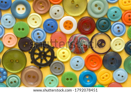 multifarious buttons for clothes on yellow . High quality photo Сток-фото © 