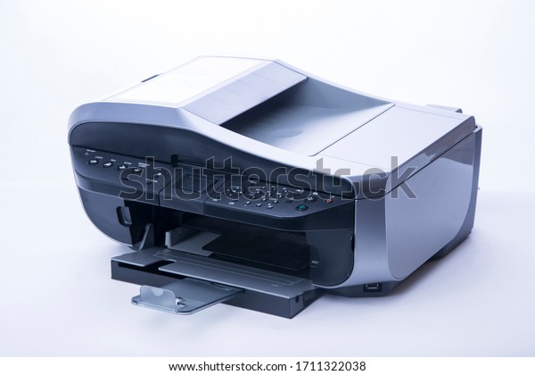 Multifunction A4 inkjet printer on white\
background. Printer, scanner, fax and\
photocopier.