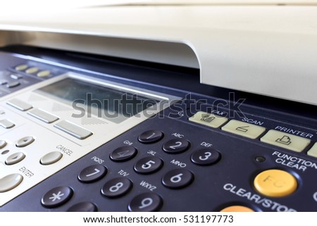 multifunction printer in the office. over light [blur and select focus background]