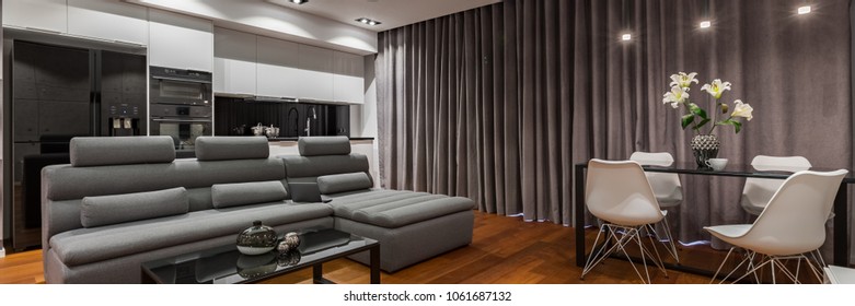 Multifunctional Home Interior With Gray, Corner Sofa And Dining Table, Panorama