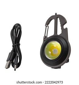 Multifunctional Portable Lamp With Led Flashlight And Cable USB Charger Isolated On A White Background