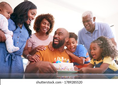 Multi-Generation African American Family Celebrating Fathers Birthday At Home Together