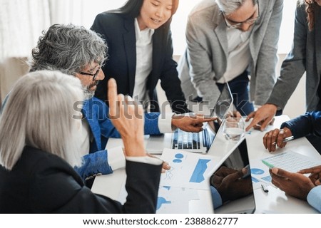 Similar – Image, Stock Photo A man and a woman sit at a table, they seem depressed and silent