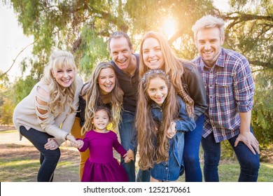 Multigenerational Mixed Race Family Portrait Outdoors.