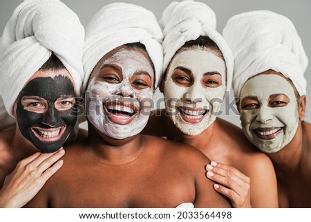 Similar – Multiethnic women with face masks taking selfie