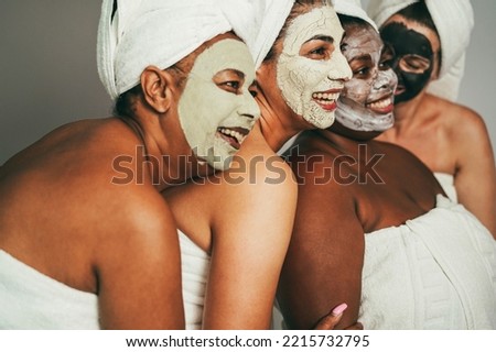 Similar – Multiethnic women with face masks taking selfie