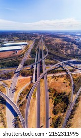 Multi-layer Highway Intersection On M4 And M7 Highways In Sydney West - Vertical Aerial Panorama.