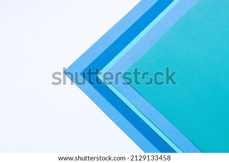 Multilayered colored cardstock background geometric design