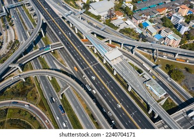 Multilevel junction motorway top view, Road traffic an important infrastructure in Thailand. Expressway Road and Roundabout. Transportation and travel concept. - Shutterstock ID 2240704171