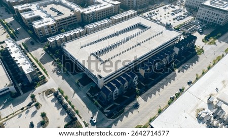 Multilevel parking solution in mixed-use development Cypress Waters, Dallas, commercial, multifamily residential, rooftop max vertical space, increases capacity without expanding ground footprint. USA
