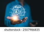 Multilingual Language Translation Technology Concept. A person holding holographic globe with speech bubbles and various languages, represents global language translate and multilingual communication.