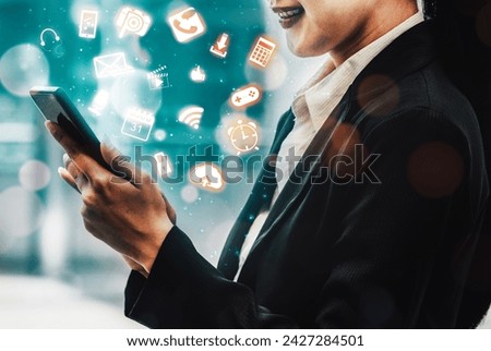 Multimedia and Computer Applications Concept. Business people using technology of digital gadget with modern interface showing social, shopping, camera and multimedia application on device. uds