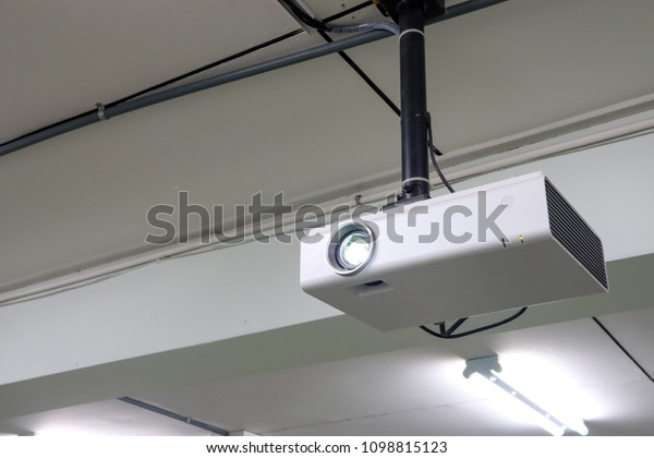 Multimedia Projector Installed On Ceiling Stock Image