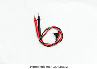 The Multimeter Probe Wires Are Red And Black. Positive And Negative Wires