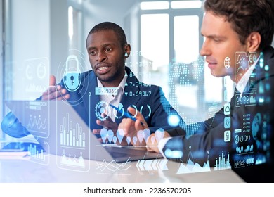 Multinational business people using laptop, virtual screen with forex diagrams and financial statistics. Diverse digital icons and interface. Concept of forex and world economy