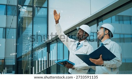 Multinational engineers discussing statistical data