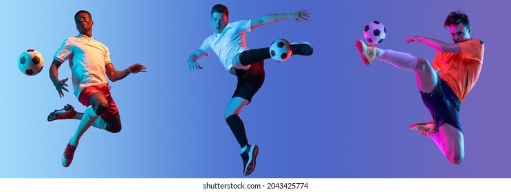 Multinational football team. Young men, professional soccer players in action training isolated over purple studio background in neon light. Flyer. Concept of sport, competition. Copy space for ad. - Powered by Shutterstock