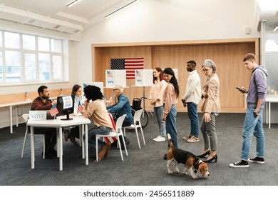 Multinational group of divers US citizens registering at polling station decorated with American flags on election day. Democracy, freedom concept - Powered by Shutterstock