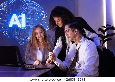 multinational team of one man and two women gathered to brainstorm and discuss their work together. They used computers to present a stock market report using AI charts.