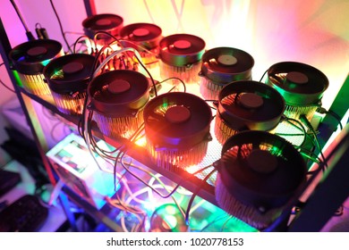 Multiple 1st generation Asic miner, CPU, Fan power supply turn up become home mini mining machine action with long shutter exposure light Art  
