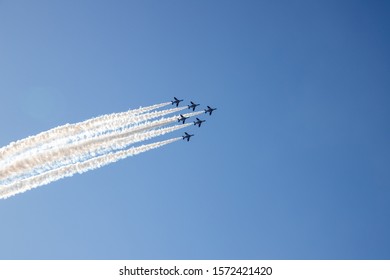 Multiple Airplanes That Fly Out Of A Contrail.