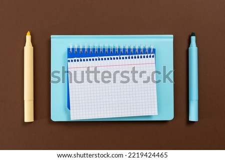 Multiple Assorted Collection Office Stationery Photo With Pens Pencils Notepads Notebook Ruler Stapler Scissors Clippers Paper Clips Holders Clipboard Placed Over Table