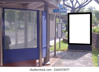 Multiple Blank Vertical Advertising Poster Banner Mockups At Bus Stop Shelter By Main Road, At Residential Neighbourhood; Out-of-home OOH Billboard Media Display Space