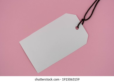 Multiple Blank White Tag Price On  Pink Background