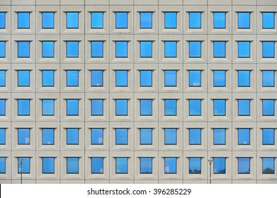Multiple blue windows on a building