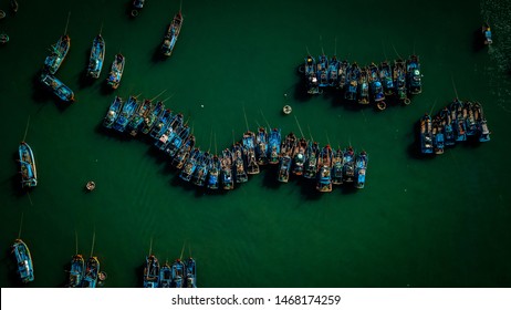 Multiple Boats Docked In Mui Ne Vietnam