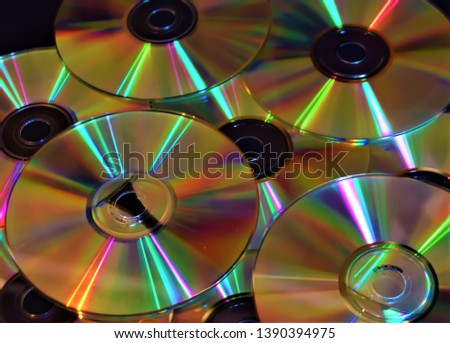 Multiple CDs DVDs discs music film data storage media