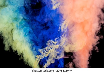 Multiple Colors Of Smoke Creating Abstract Background On Black Wallpaper.