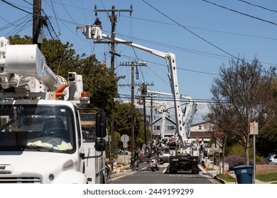 Multiple crews work on power lines