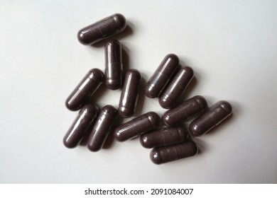 Multiple Dark Purple Capsules Of Bilberry Extract Dietary Supplement