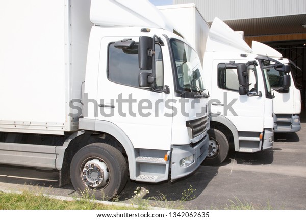Multiple
delivery small van transportation truck
park
