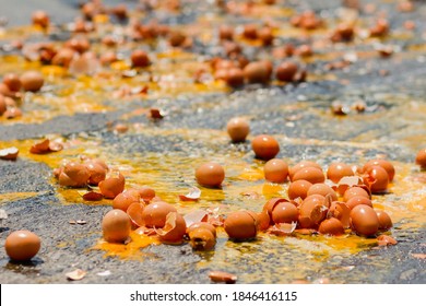 Multiple Eggs Crashed On The Road Due To An Accident In An Egg Delivery Truck That Was About To Deliver Eggs To Restaurants In The Morning. Concept Of Accidental Loss And Delay