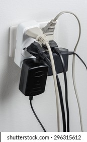 Multiple Electrical Plugs In Wall Outlet