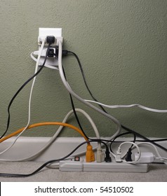 Multiple Electrical Plugs In Wall Outlet