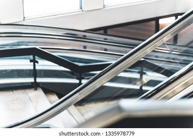 Multiple Escalators Going Up And Down