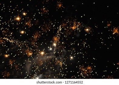 multiple explosions in night sky