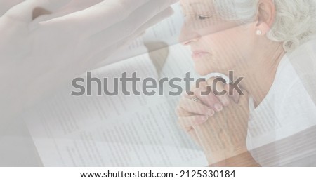Multiple exposure of caucasian senior woman praying and hands clasped over bible. spirituality, religion, worshipper, meditation, christianity and national day of prayer.