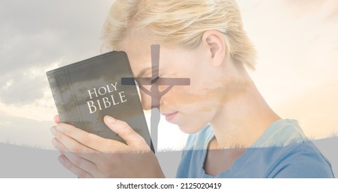 Multiple Exposure Of Caucasian Young Woman With Bible Praying And Silhouette Cross Against Sky. Spirituality, Religion, Worshipper, Meditation, Christianity And National Day Of Prayer.