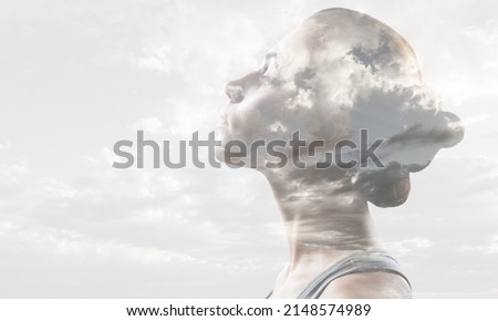 Multiple exposure clouds Woman mental health and weather dependent concept.