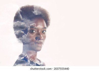 Multiple Exposure Image With Clouds And Sky Inside African American Woman Portrait. Mental Health And Calm.