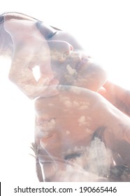 Multiple Exposure Portrait Of Young Woman Combined With Photograph Of Clouds