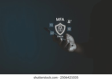 Multiple Factor Authentication MFA method uses portable devices to protect data and account for internet data security concept. Businessman finger touching a secure computer technology graphics icon.